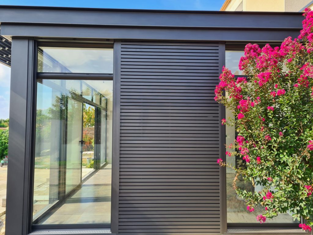 Véranda en aluminium avec fermeture Mur by Concept