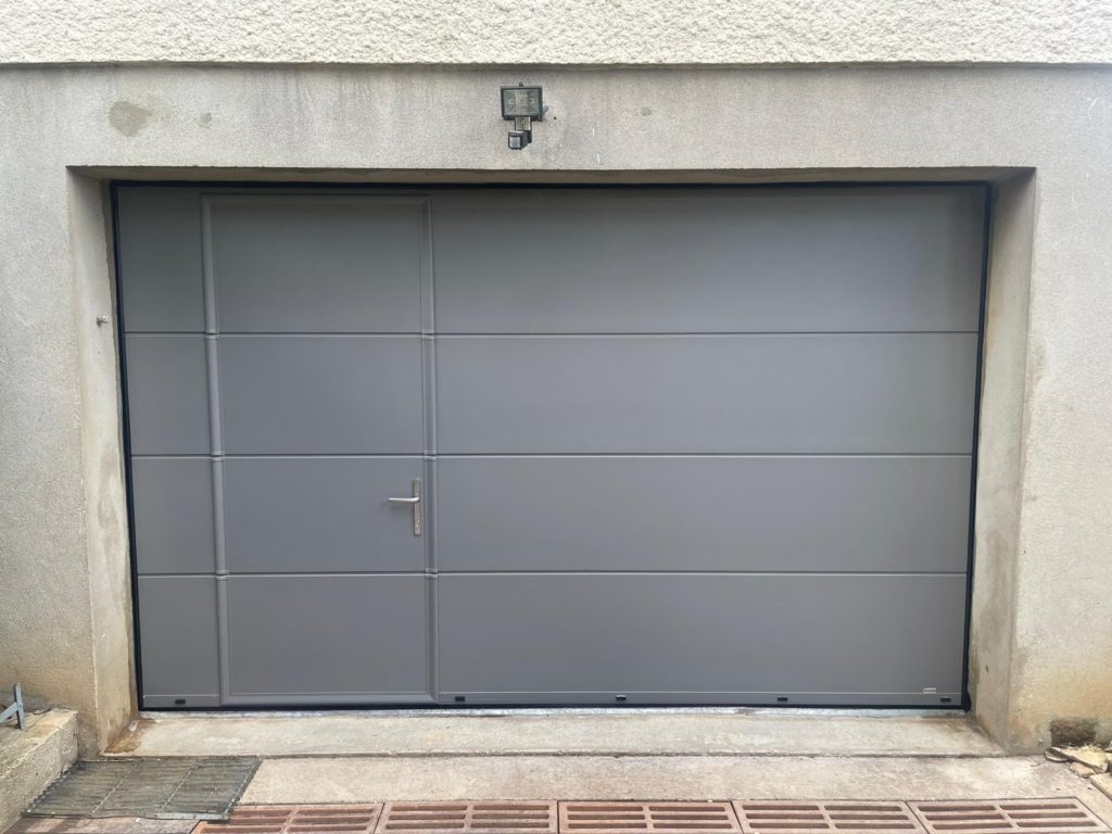 Porte de garage sectionnelle avec Portillon